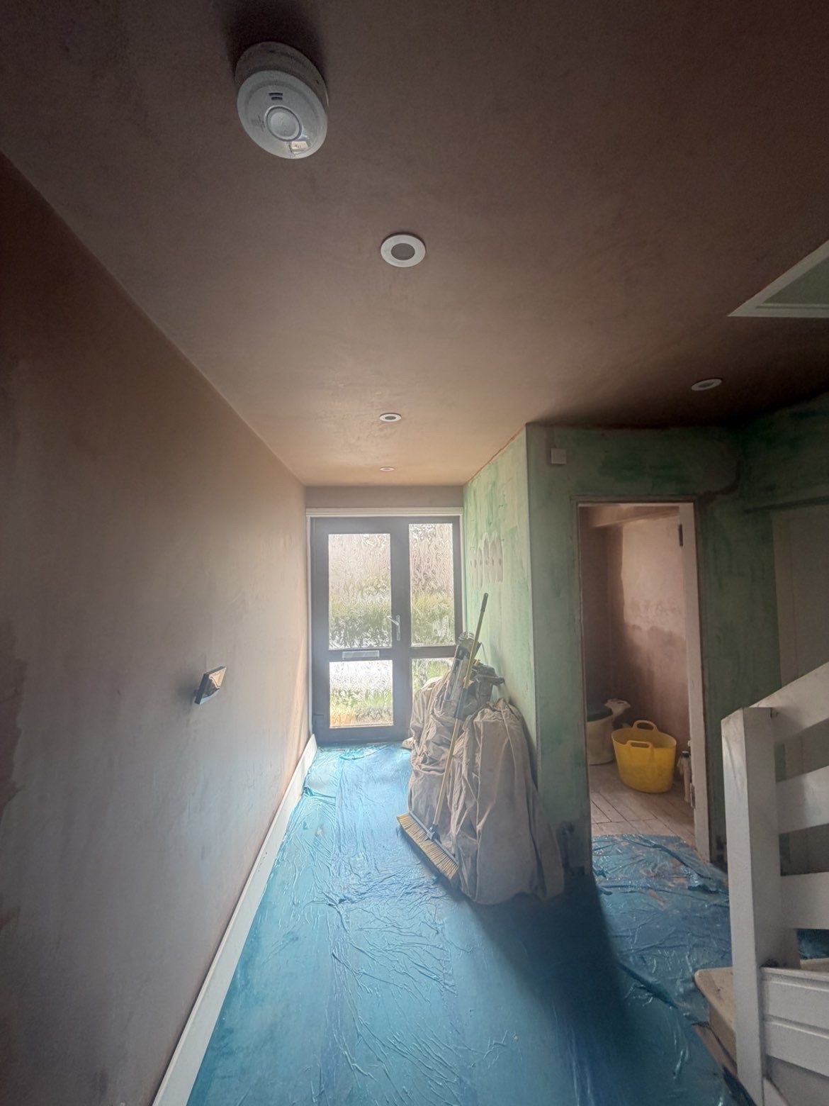Hallway walls and ceiling fully re-skimmed