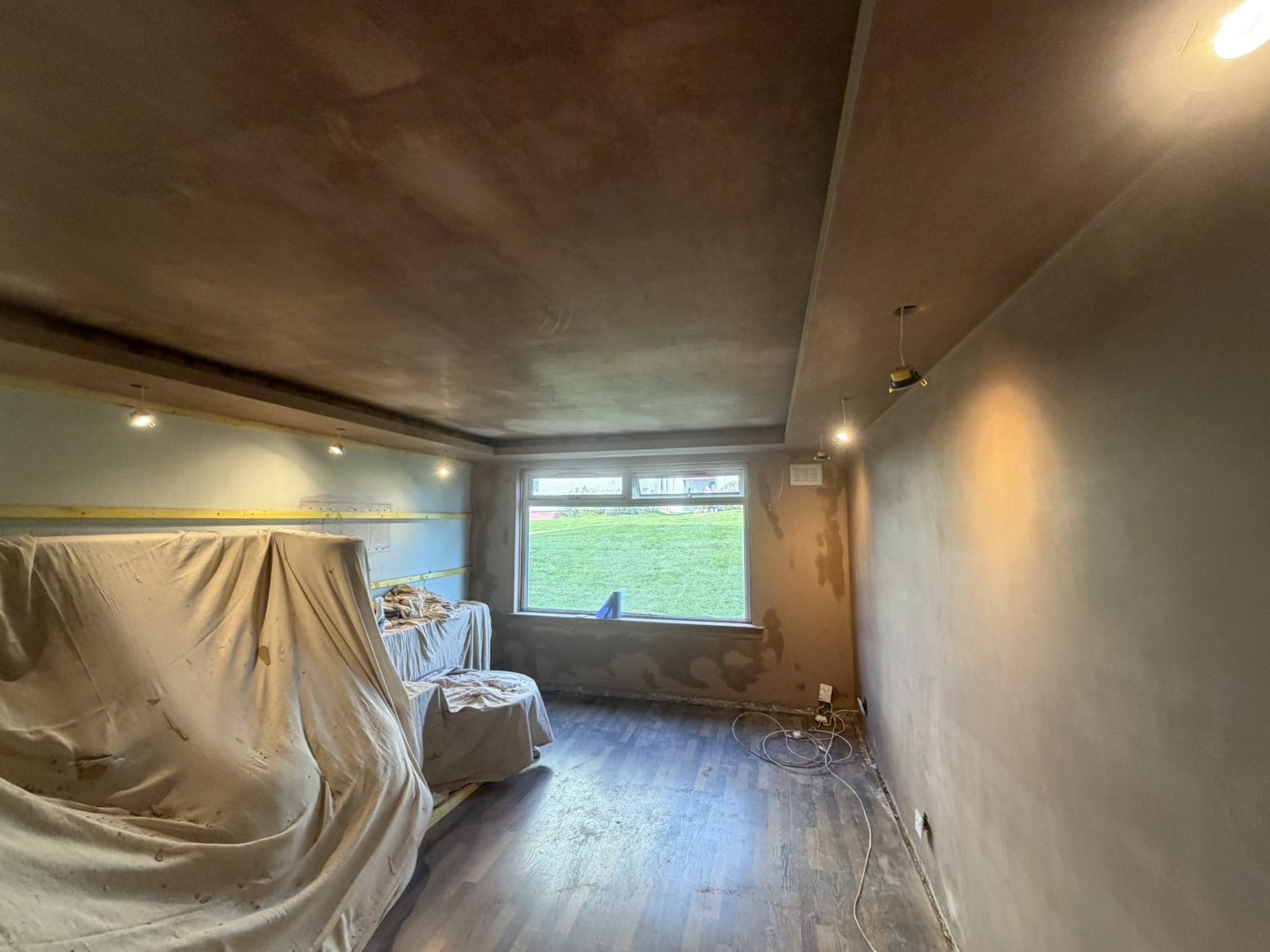 Bedroom walls and ceiling re-skimmed, ready for decoration