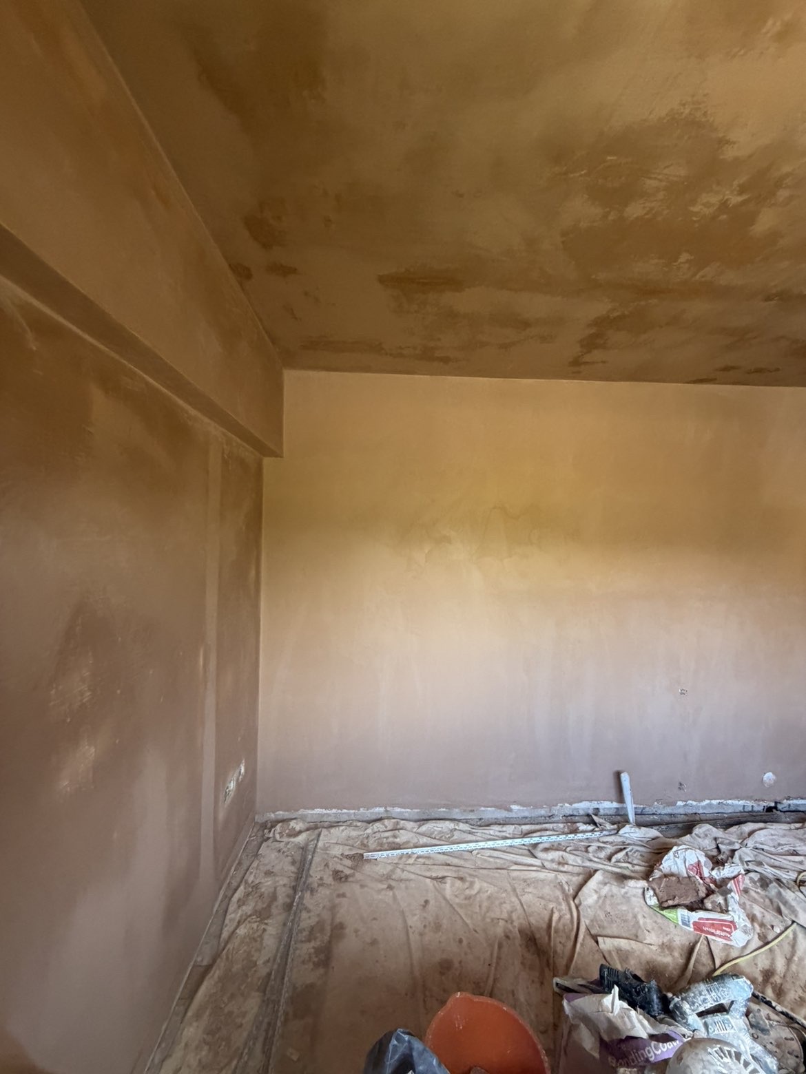 Bedroom walls and ceiling skimmed around bulkhead, smooth finish