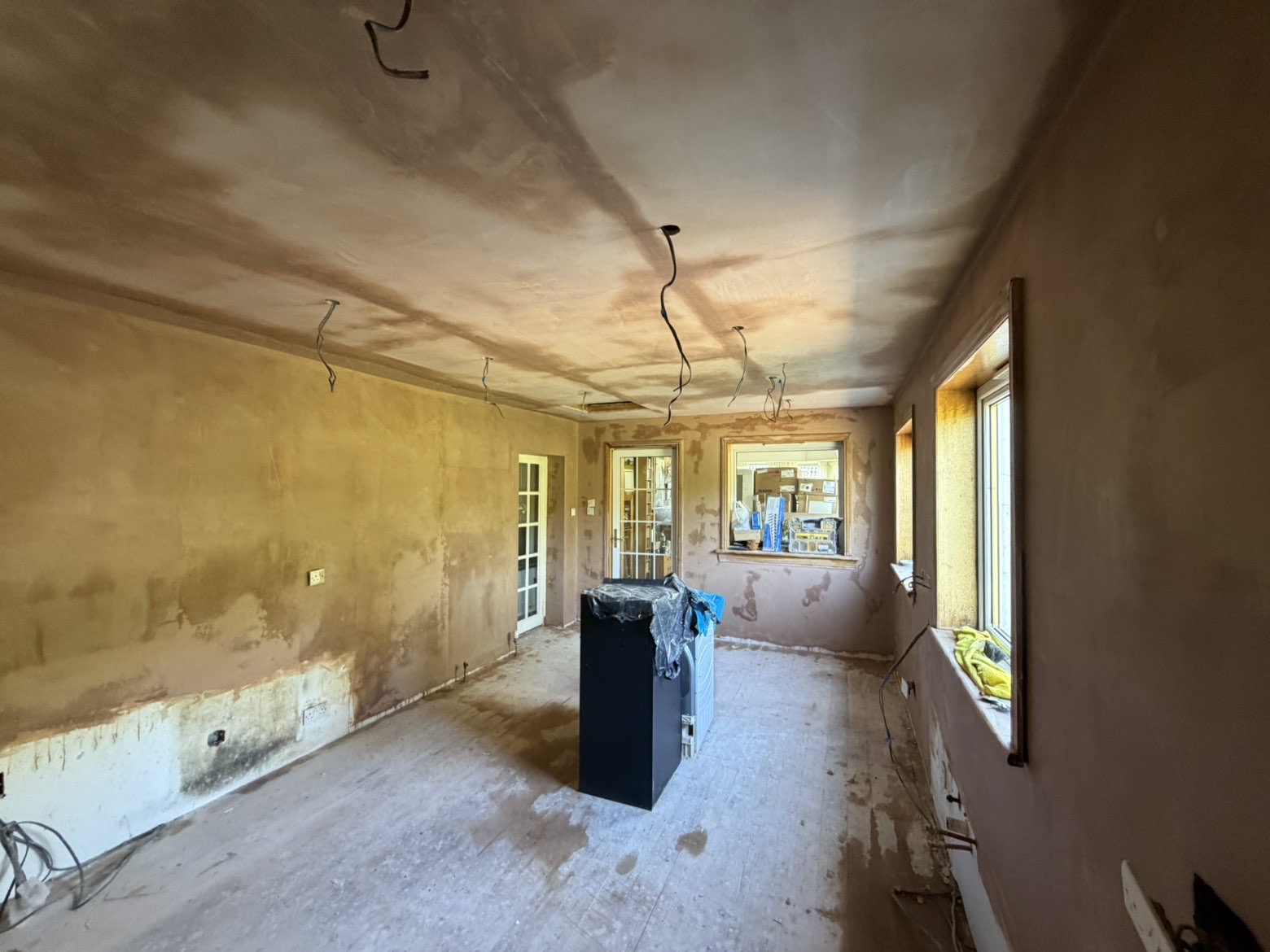 Large living/dining room fully re-skimmed, walls and ceiling